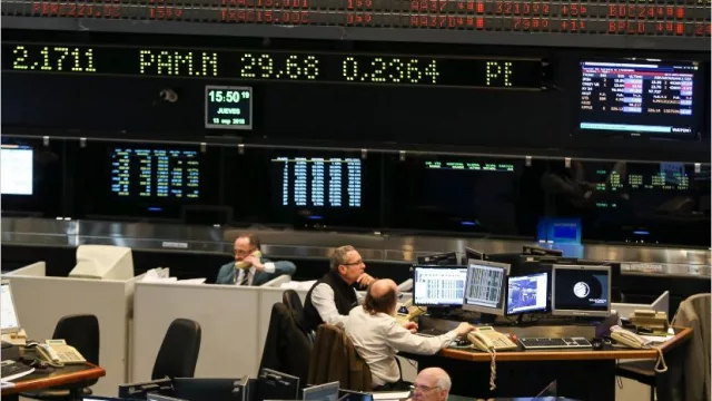 La Fed baja la tasa pero el mercado local sigue atento a las Paso